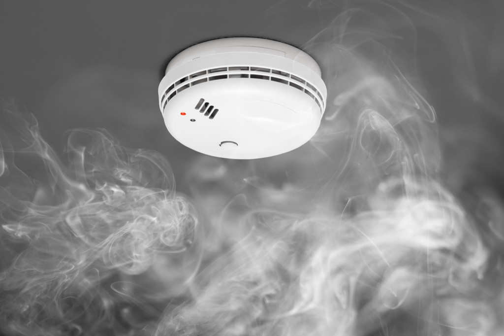 smoke detector of fire alarm in action