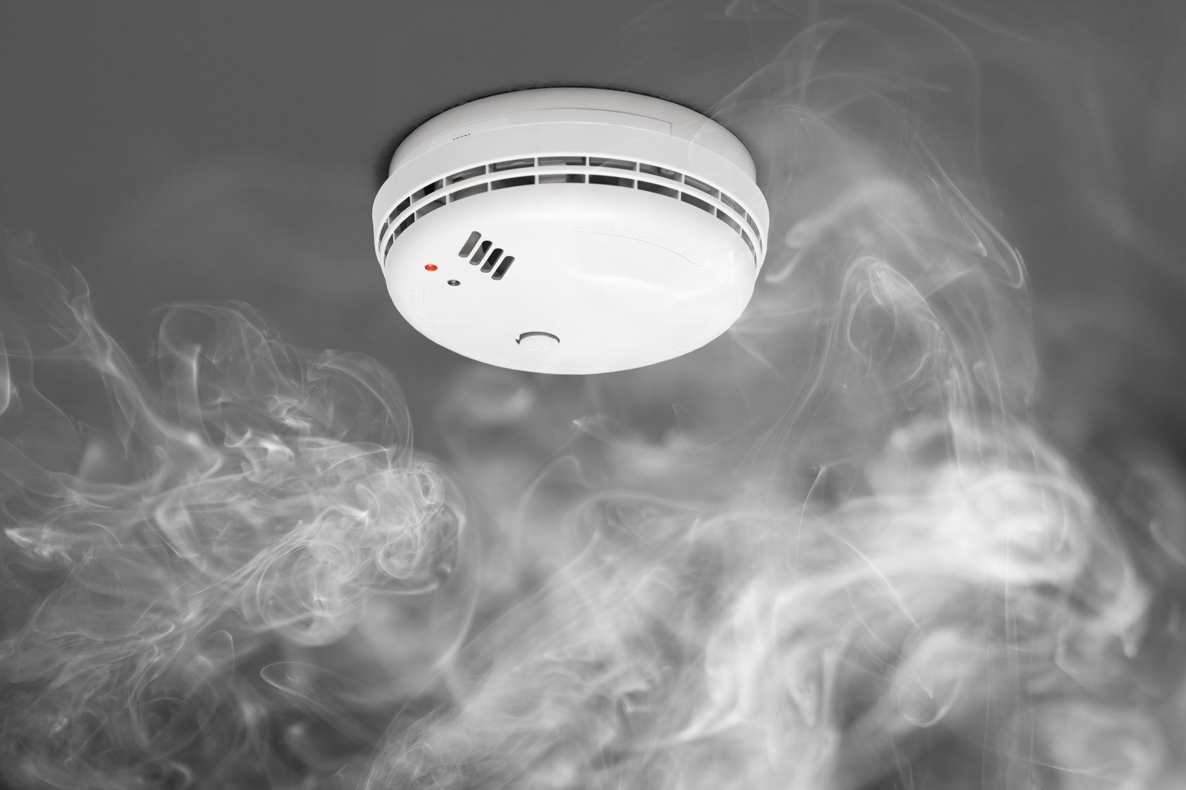 smoke detector of fire alarm in action.